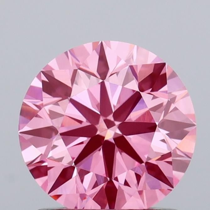 Loose Diamond - ROUND 1.05ct Fancy Vivid Pink VVS2: Loose Diamond - ROUND 1.05ct Fancy Vivid Pink VVS2 Source: This is a real non-mined Diamond that has been grown in a lab Shape: ROUND Carats: 1.05 Color: Fancy Vivid Pink Certification: IGI Video: