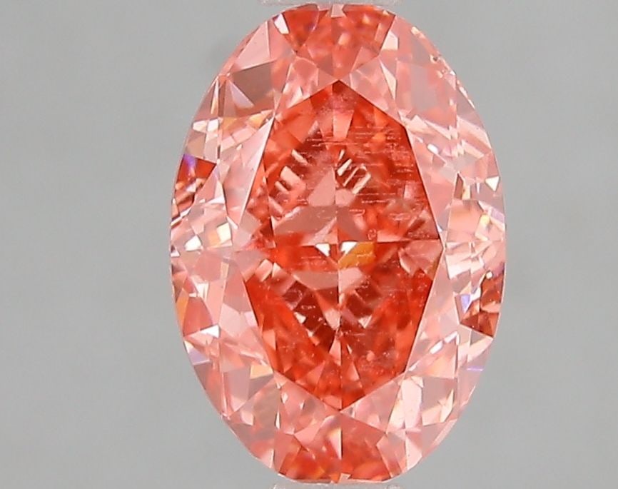Loose Diamond - OVAL 1.94ct Fancy Vivid Pink VS1: Loose Diamond - OVAL 1.94ct Fancy Vivid Pink VS1 Source: This is a real non-mined Diamond that has been grown in a lab Shape: OVAL Carats: 1.94 Color: Fancy Vivid Pink Certification: IGI Video: