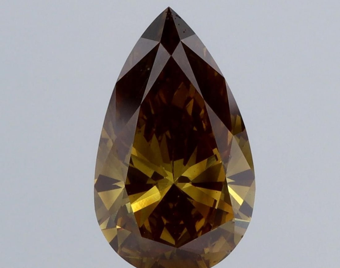 Loose Diamond - PEAR 1.98ct Brown VS1: Loose Diamond - PEAR 1.98ct Brown VS1 Source: This is a real non-mined Diamond that has been grown in a lab Shape: PEAR Carats: 1.98 Color: Brown Certification: NONE Video: