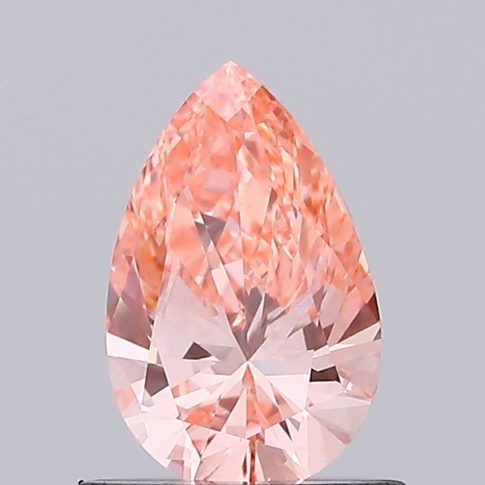 Loose Diamond - PEAR 0.68ct Fancy Vivid Pink VVS2: Loose Diamond - PEAR 0.68ct Fancy Vivid Pink VVS2 Source: This is a real non-mined Diamond that has been grown in a lab Shape: PEAR Carats: 0.68 Color: Fancy Vivid Pink Certification: IGI Video:
