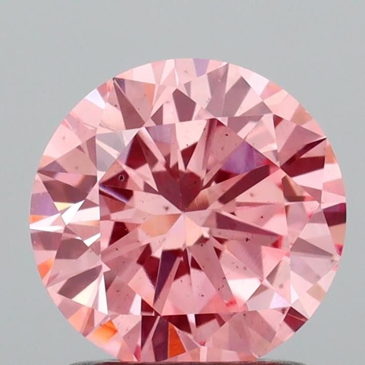 Loose Diamond - ROUND 1.27ct Fancy Vivid Pink SI1: Loose Diamond - ROUND 1.27ct Fancy Vivid Pink SI1 Source: This is a real non-mined Diamond that has been grown in a lab Shape: ROUND Carats: 1.27 Color: Fancy Vivid Pink Certification: IGI Video:
