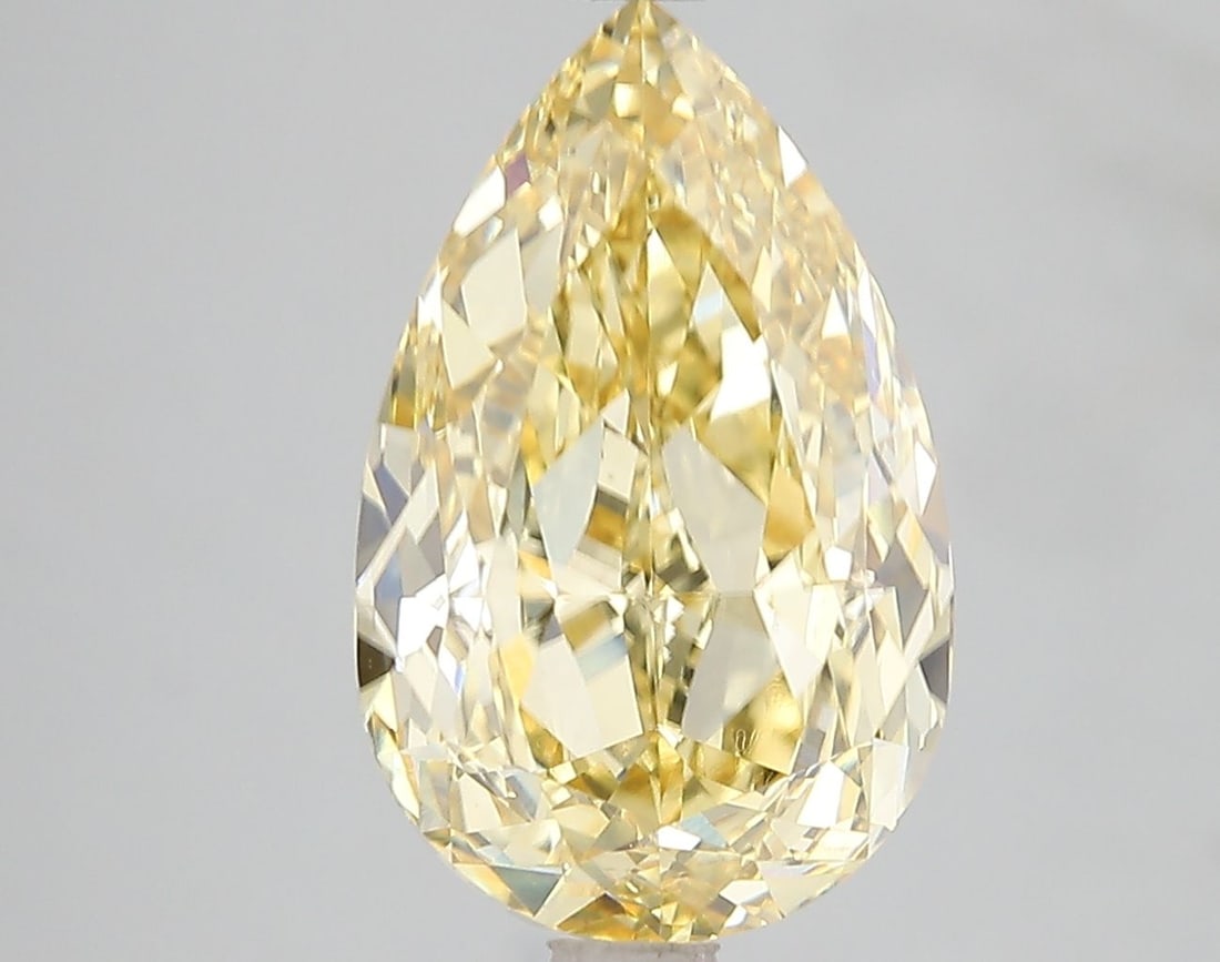 Loose Diamond - PEAR 5.09ct Fancy Vivid Yellow VS1: Loose Diamond - PEAR 5.09ct Fancy Vivid Yellow VS1 Source: This is a real non-mined Diamond that has been grown in a lab Shape: PEAR Carats: 5.09 Color: Fancy Vivid Yellow Certification: IGI Video: