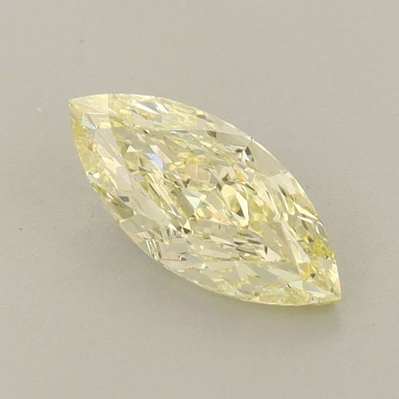 Loose Diamond - MARQUISE 0.85ct Fancy Light Yellow VS1: Loose Diamond - MARQUISE 0.85ct Fancy Light Yellow VS1 Source: This is a real non-mined Diamond that has been grown in a lab Shape: MARQUISE Carats: 0.85 Color: Fancy Light Yellow Certification: IGI V
