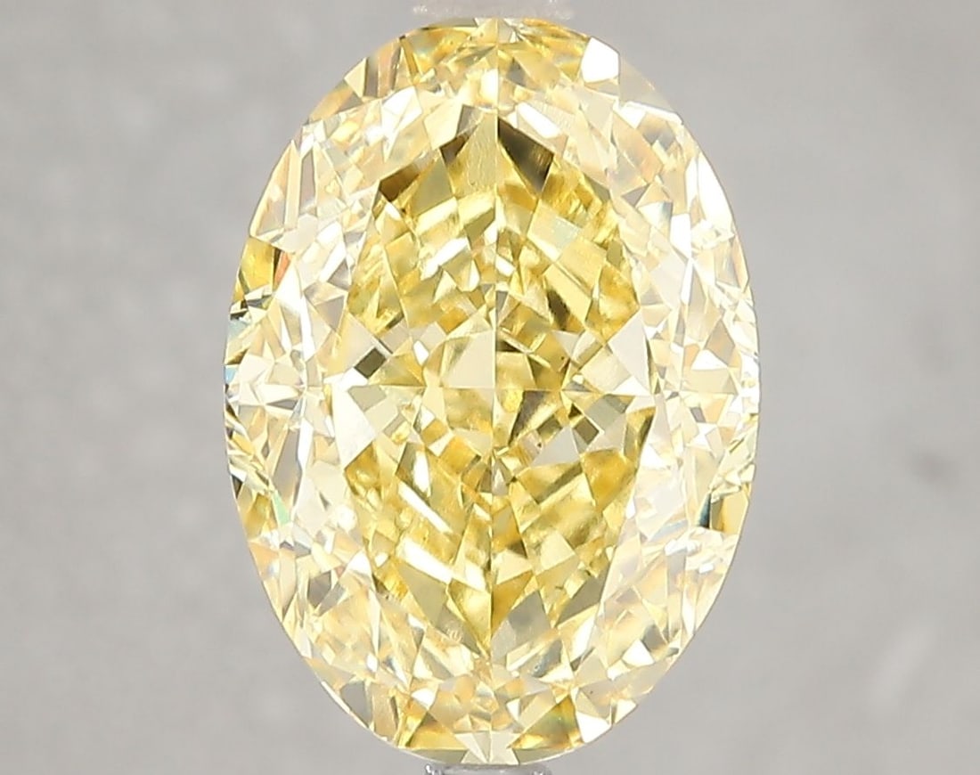 Loose Diamond - OVAL 5.02ct Fancy Vivid Yellow VS1: Loose Diamond - OVAL 5.02ct Fancy Vivid Yellow VS1 Source: This is a real non-mined Diamond that has been grown in a lab Shape: OVAL Carats: 5.02 Color: Fancy Vivid Yellow Certification: IGI Video:
