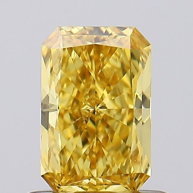 Loose Diamond - RADIANT 0.59ct Fancy Vivid Yellow VS1: Loose Diamond - RADIANT 0.59ct Fancy Vivid Yellow VS1 Source: This is a real non-mined Diamond that has been grown in a lab Shape: RADIANT Carats: 0.59 Color: Fancy Vivid Yellow Certification: IGI Vid