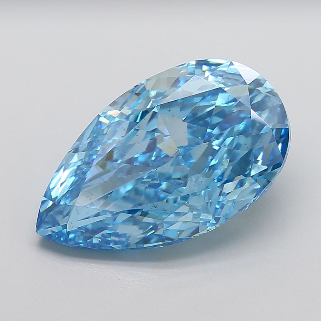 Loose Diamond - PEAR 13.04ct Fancy Vivid Blue VS2: Loose Diamond - PEAR 13.04ct Fancy Vivid Blue VS2 Source: This is a real non-mined Diamond that has been grown in a lab Shape: PEAR Carats: 13.04 Color: Fancy Vivid Blue Certification: IGI Video:
