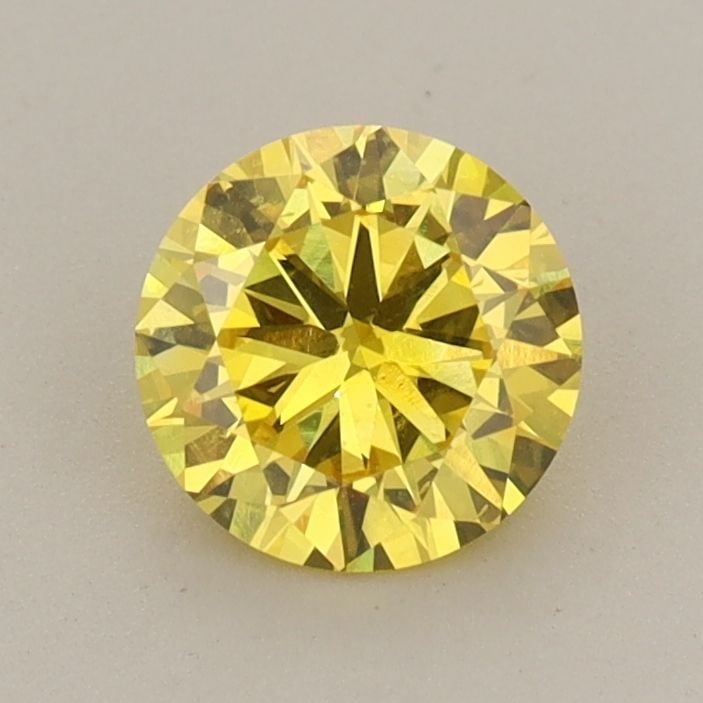 Loose Diamond - ROUND 0.81ct Fancy Vivid Yellow VS2: Loose Diamond - ROUND 0.81ct Fancy Vivid Yellow VS2 Source: This is a real non-mined Diamond that has been grown in a lab Shape: ROUND Carats: 0.81 Color: Fancy Vivid Yellow Certification: IGI Video: