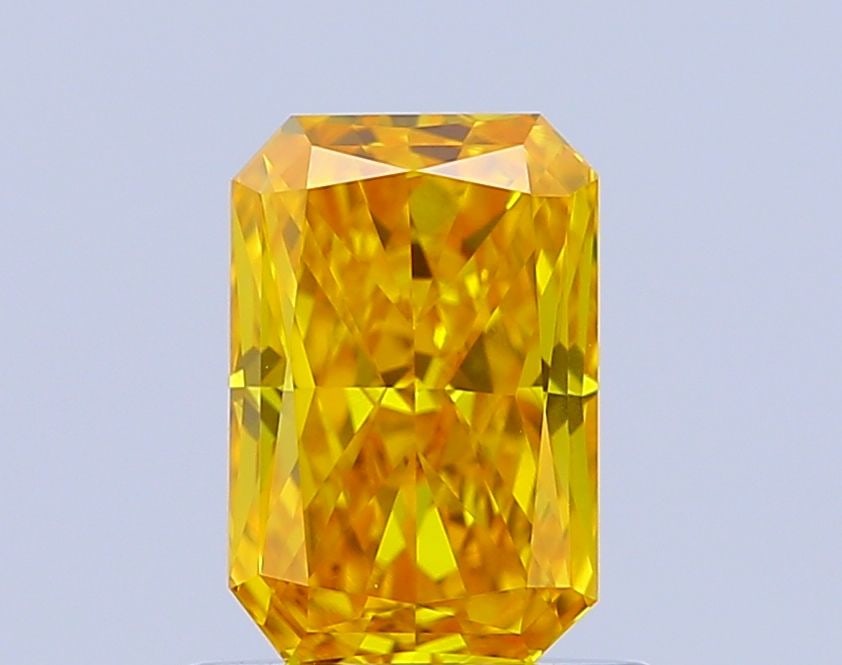 Loose Diamond - RADIANT 0.91ct Fancy Vivid Yellow VVS2: Loose Diamond - RADIANT 0.91ct Fancy Vivid Yellow VVS2 Source: This is a real non-mined Diamond that has been grown in a lab Shape: RADIANT Carats: 0.91 Color: Fancy Vivid Yellow Certification: IGI Vi