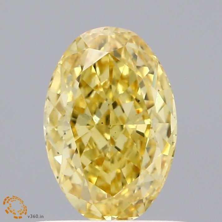 Loose Diamond - OVAL 0.94ct Fancy Vivid Yellow VS2: Loose Diamond - OVAL 0.94ct Fancy Vivid Yellow VS2 Source: This is a real non-mined Diamond that has been grown in a lab Shape: OVAL Carats: 0.94 Color: Fancy Vivid Yellow Certification: IGI Video: