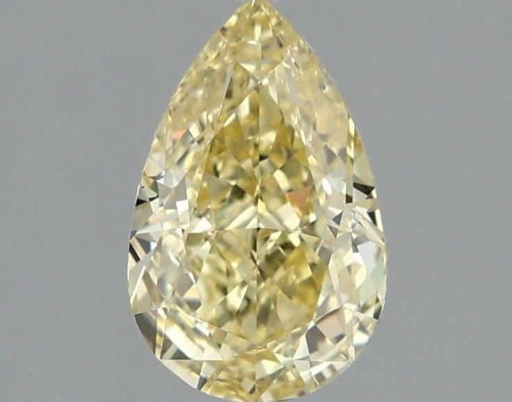 Loose Diamond - PEAR 1.3ct Fancy Yellow VS1: Loose Diamond - PEAR 1.3ct Fancy Yellow VS1 Source: This is a real non-mined Diamond that has been grown in a lab Shape: PEAR Carats: 1.3 Color: Fancy Yellow Certification: IGI Video: