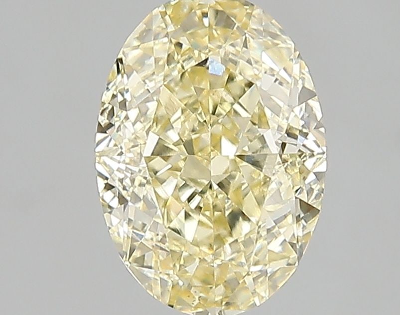 Loose Diamond - OVAL 1.55ct Fancy Intense Yellow VS2: Loose Diamond - OVAL 1.55ct Fancy Intense Yellow VS2 Source: This is a real non-mined Diamond that has been grown in a lab Shape: OVAL Carats: 1.55 Color: Fancy Intense Yellow Certification: IGI The D