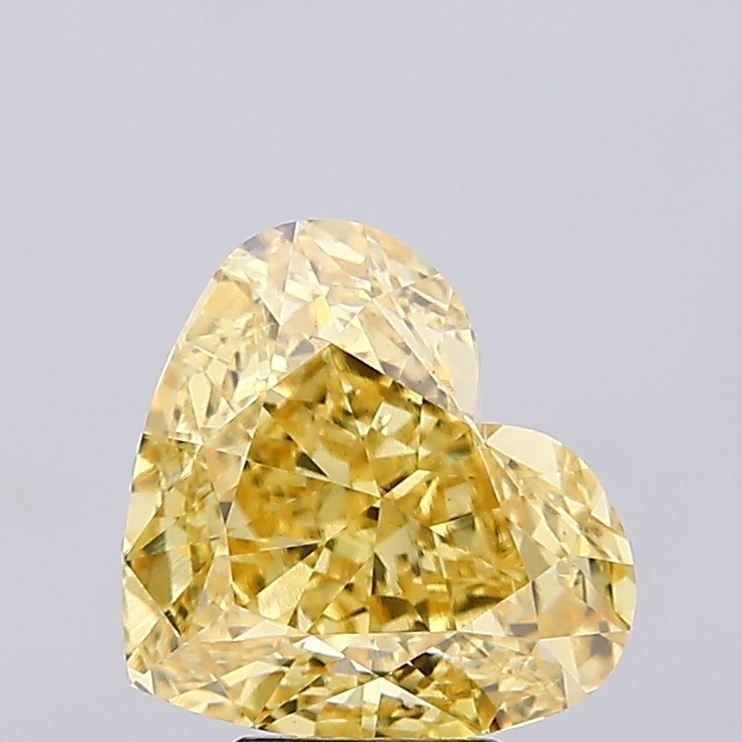 Loose Diamond - HEART 5.52ct Fancy Vivid Yellow VS1: Loose Diamond - HEART 5.52ct Fancy Vivid Yellow VS1 Source: This is a real non-mined Diamond that has been grown in a lab Shape: HEART Carats: 5.52 Color: Fancy Vivid Yellow Certification: IGI Video: