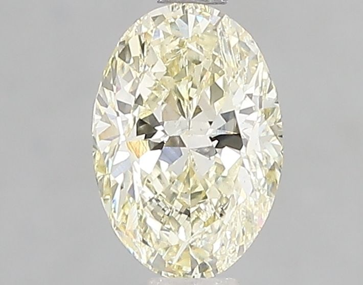 Loose Diamond - OVAL 1.13ct Fancy Light Yellow VS1: Loose Diamond - OVAL 1.13ct Fancy Light Yellow VS1 Source: This is a real non-mined Diamond that has been grown in a lab Shape: OVAL Carats: 1.13 Color: Fancy Light Yellow Certification: IGI Video: