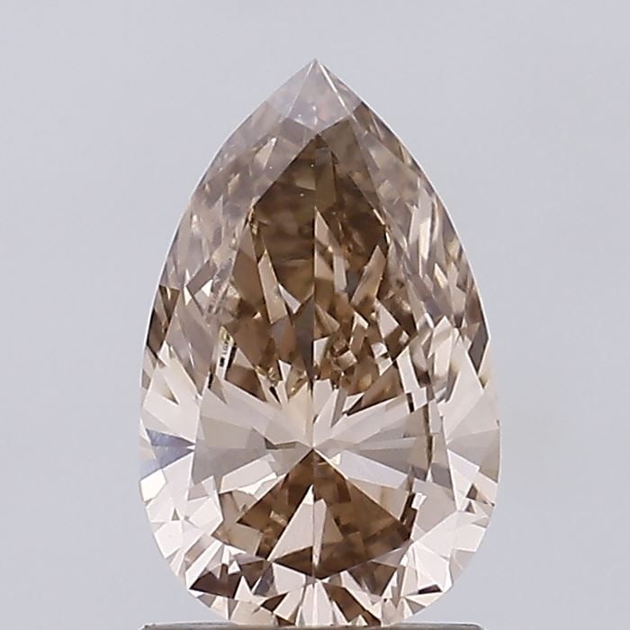 Loose Diamond - PEAR 1.41ct Fancy Brown VVS2: Loose Diamond - PEAR 1.41ct Fancy Brown VVS2 Source: This is a real non-mined Diamond that has been grown in a lab Shape: PEAR Carats: 1.41 Color: Fancy Brown Certification: IGI Video: