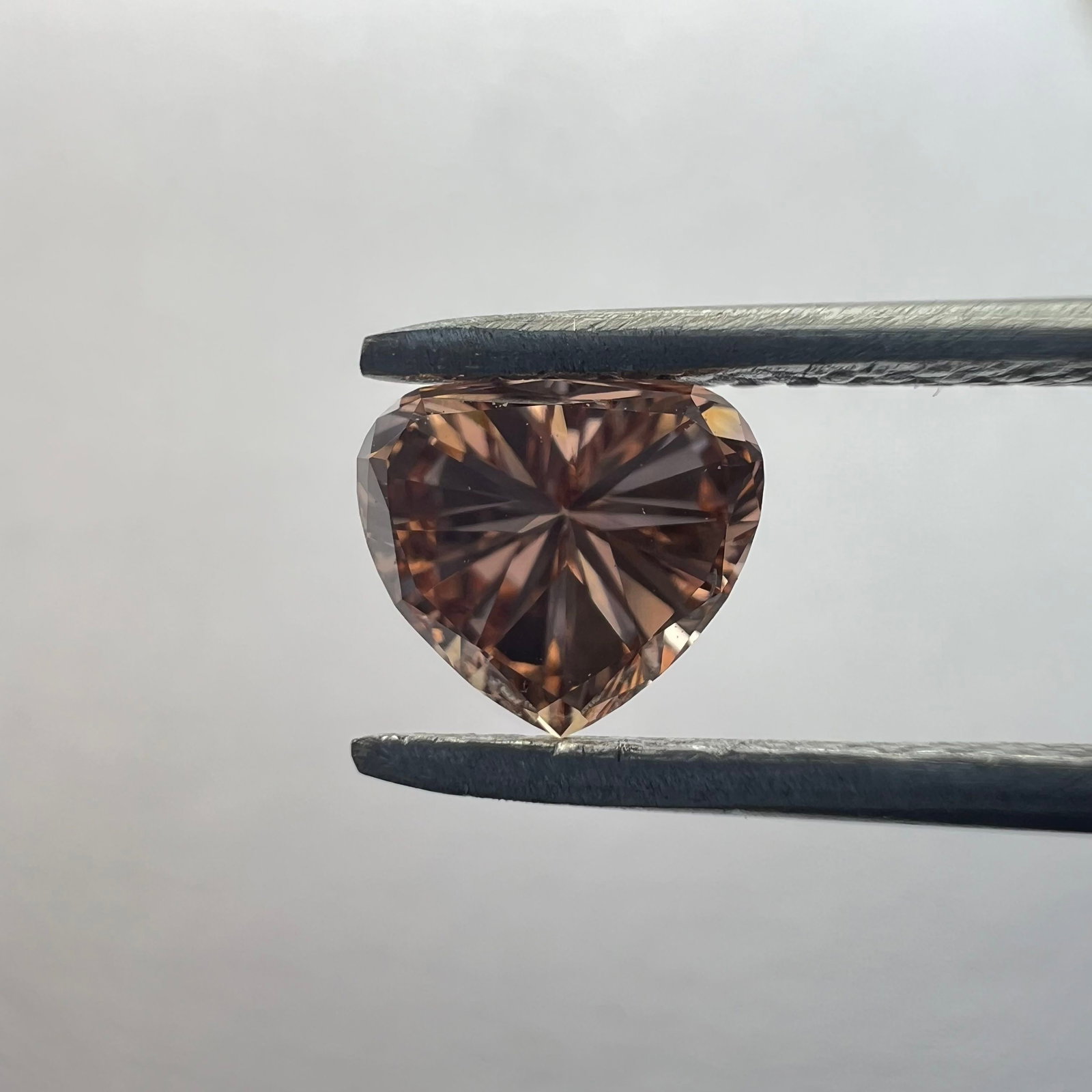 Loose Diamond - HEART 0.55ct Orange VVS2: Loose Diamond - HEART 0.55ct Orange VVS2 Source: This is a real non-mined Diamond that has been grown in a lab Shape: HEART Carats: 0.55 Color: Orange Certification: NONE The Diamond Depot Guarantee: 