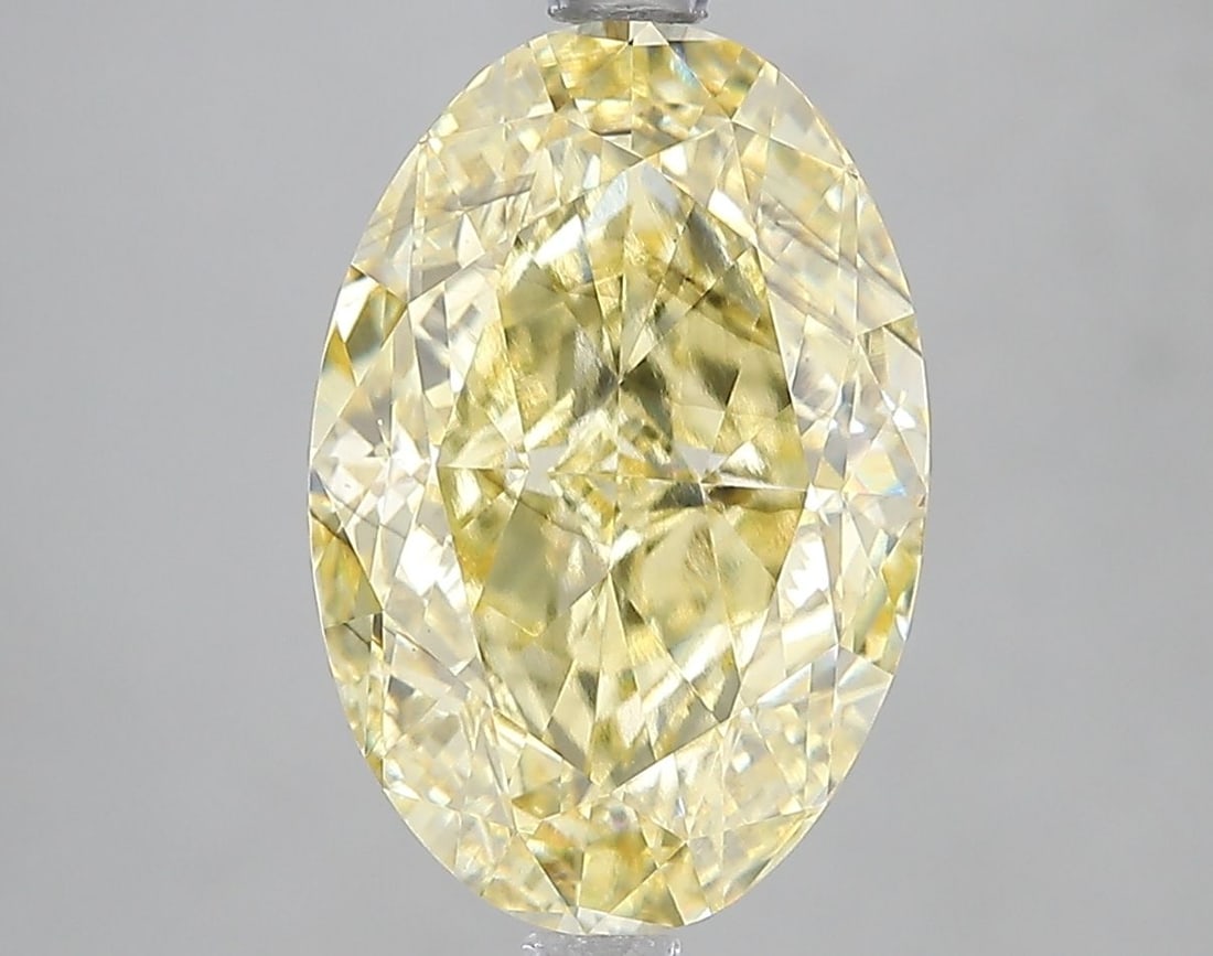 Loose Diamond - OVAL 5.08ct Fancy Intense Yellow SI1: Loose Diamond - OVAL 5.08ct Fancy Intense Yellow SI1 Source: This is a real non-mined Diamond that has been grown in a lab Shape: OVAL Carats: 5.08 Color: Fancy Intense Yellow Certification: IGI Video