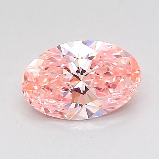 Loose Diamond - OVAL 0.82ct Fancy Vivid Pink VS1: Loose Diamond - OVAL 0.82ct Fancy Vivid Pink VS1 Source: This is a real non-mined Diamond that has been grown in a lab Shape: OVAL Carats: 0.82 Color: Fancy Vivid Pink Certification: IGI Video: