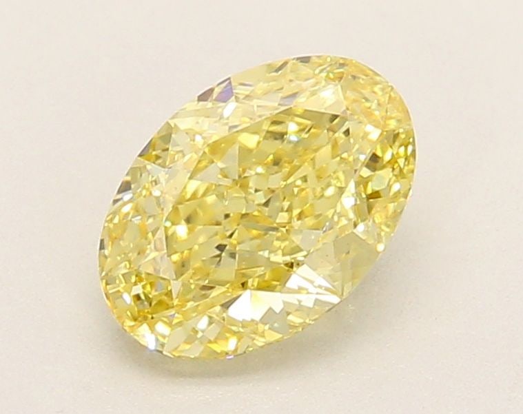 Loose Diamond - OVAL 1.53ct Fancy Yellow VVS2: Loose Diamond - OVAL 1.53ct Fancy Yellow VVS2 Source: This is a real non-mined Diamond that has been grown in a lab Shape: OVAL Carats: 1.53 Color: Fancy Yellow Certification: IGI Video: