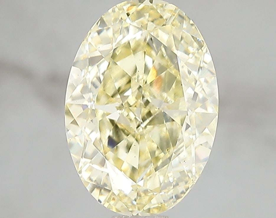 Loose Diamond - OVAL 3.01ct Fancy Intense Yellow VS2: Loose Diamond - OVAL 3.01ct Fancy Intense Yellow VS2 Source: This is a real non-mined Diamond that has been grown in a lab Shape: OVAL Carats: 3.01 Color: Fancy Intense Yellow Certification: IGI Video