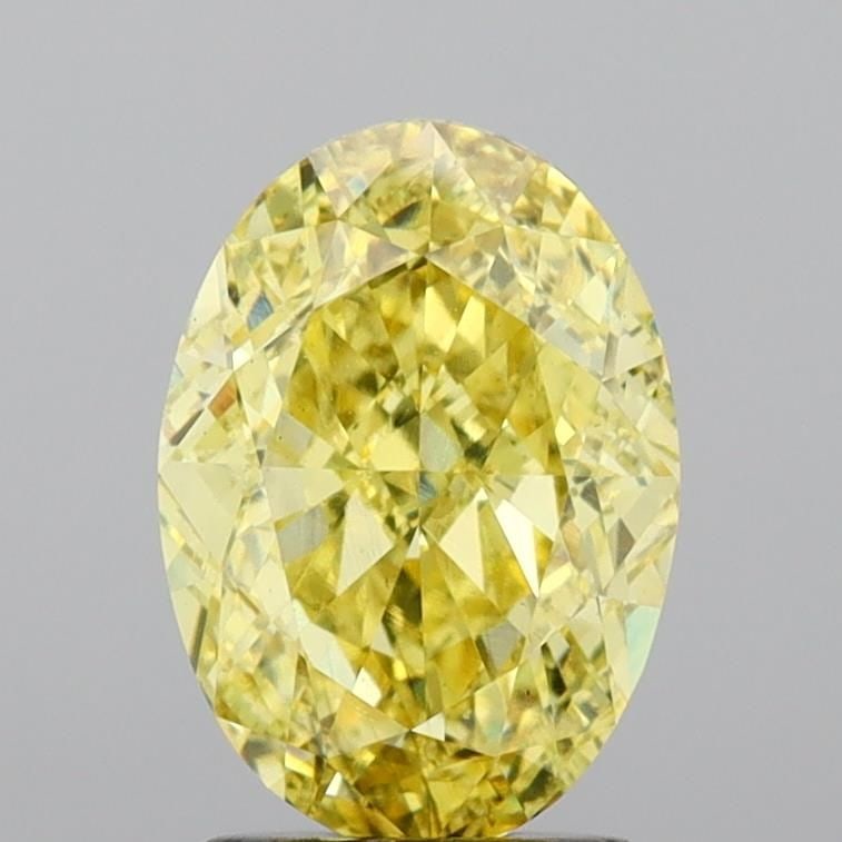 Loose Diamond - OVAL 3.07ct Fancy Vivid Yellow VS2: Loose Diamond - OVAL 3.07ct Fancy Vivid Yellow VS2 Source: This is a real non-mined Diamond that has been grown in a lab Shape: OVAL Carats: 3.07 Color: Fancy Vivid Yellow Certification: IGI Video: