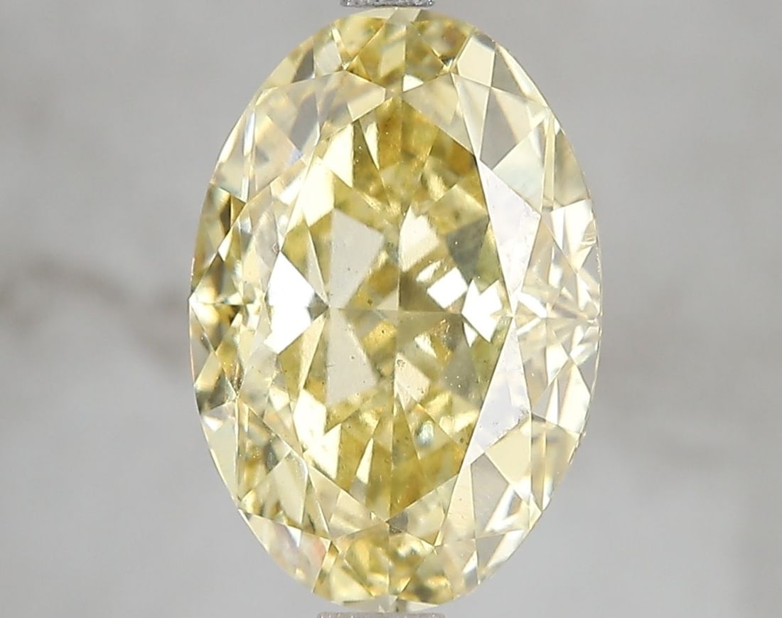 Loose Diamond - OVAL 5.05ct Fancy Vivid Yellow VS2: Loose Diamond - OVAL 5.05ct Fancy Vivid Yellow VS2 Source: This is a real non-mined Diamond that has been grown in a lab Shape: OVAL Carats: 5.05 Color: Fancy Vivid Yellow Certification: IGI Video: