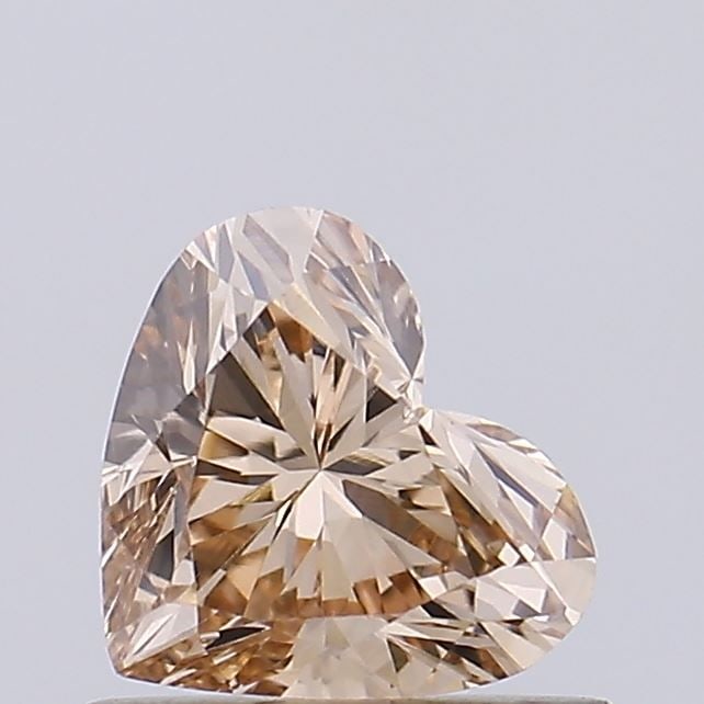 Loose Diamond - HEART 0.68ct Fancy Vivid Brown VVS2: Loose Diamond - HEART 0.68ct Fancy Vivid Brown VVS2 Source: This is a real non-mined Diamond that has been grown in a lab Shape: HEART Carats: 0.68 Color: Fancy Vivid Brown Certification: NONE Video: