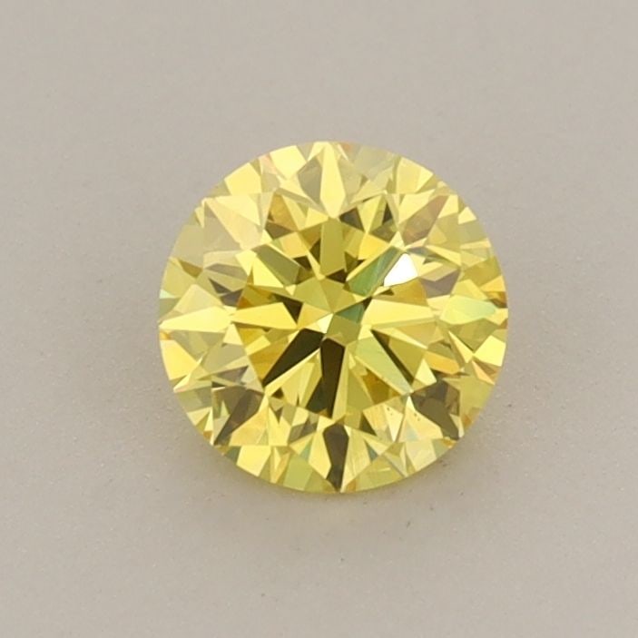 Ideal Loose Diamond - ROUND 0.57ct Fancy Vivid Yellow VS2: Ideal Loose Diamond - ROUND 0.57ct Fancy Vivid Yellow VS2 Source: This is a real non-mined Diamond that has been grown in a lab Shape: ROUND Carats: 0.57 Color: Fancy Vivid Yellow Certification: IGI V