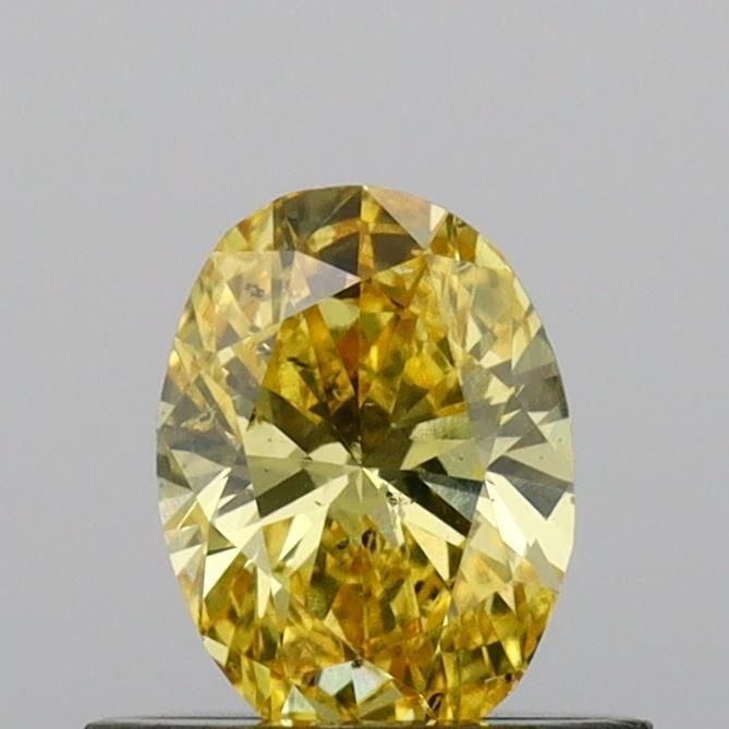 Loose Diamond - OVAL 0.49ct Fancy Vivid Yellow SI2: Loose Diamond - OVAL 0.49ct Fancy Vivid Yellow SI2 Source: This is a real non-mined Diamond that has been grown in a lab Shape: OVAL Carats: 0.49 Color: Fancy Vivid Yellow Certification: IGI Video: