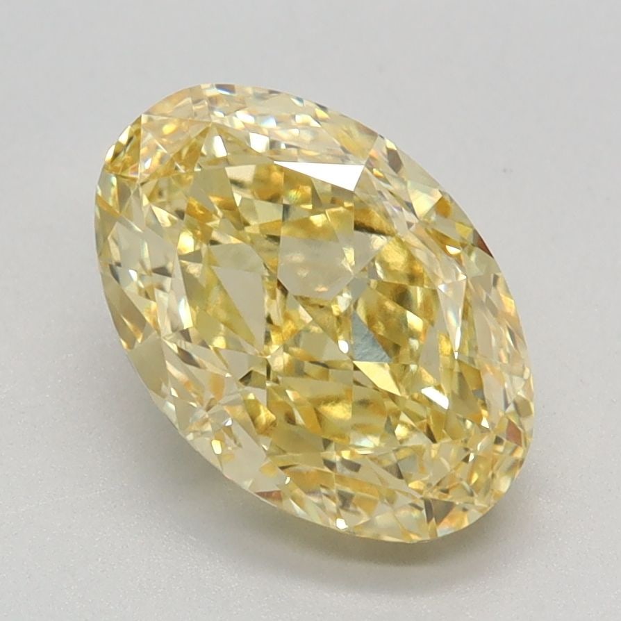 Loose Diamond - OVAL 2.24ct Fancy Vivid Yellow VVS2: Loose Diamond - OVAL 2.24ct Fancy Vivid Yellow VVS2 Source: This is a real non-mined Diamond that has been grown in a lab Shape: OVAL Carats: 2.24 Color: Fancy Vivid Yellow Certification: IGI Video: