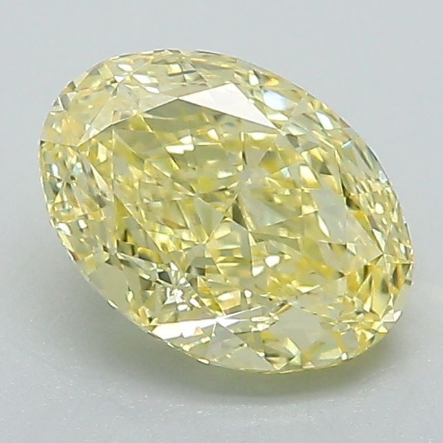 Loose Diamond - OVAL 1.42ct Fancy Vivid Yellow VS1: Loose Diamond - OVAL 1.42ct Fancy Vivid Yellow VS1 Source: This is a real non-mined Diamond that has been grown in a lab Shape: OVAL Carats: 1.42 Color: Fancy Vivid Yellow Certification: IGI Video: