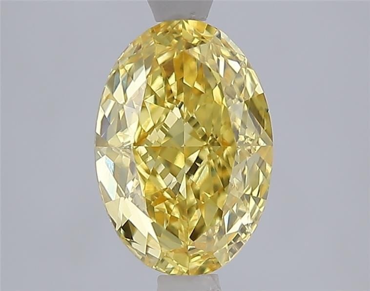 Loose Diamond - OVAL 2.07ct Fancy Vivid Yellow VVS2: Loose Diamond - OVAL 2.07ct Fancy Vivid Yellow VVS2 Source: This is a real non-mined Diamond that has been grown in a lab Shape: OVAL Carats: 2.07 Color: Fancy Vivid Yellow Certification: IGI Video: