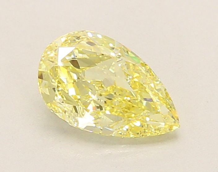 Loose Diamond - PEAR 1.03ct Fancy Intense Yellow VVS2: Loose Diamond - PEAR 1.03ct Fancy Intense Yellow VVS2 Source: This is a real non-mined Diamond that has been grown in a lab Shape: PEAR Carats: 1.03 Color: Fancy Intense Yellow Certification: IGI Vide