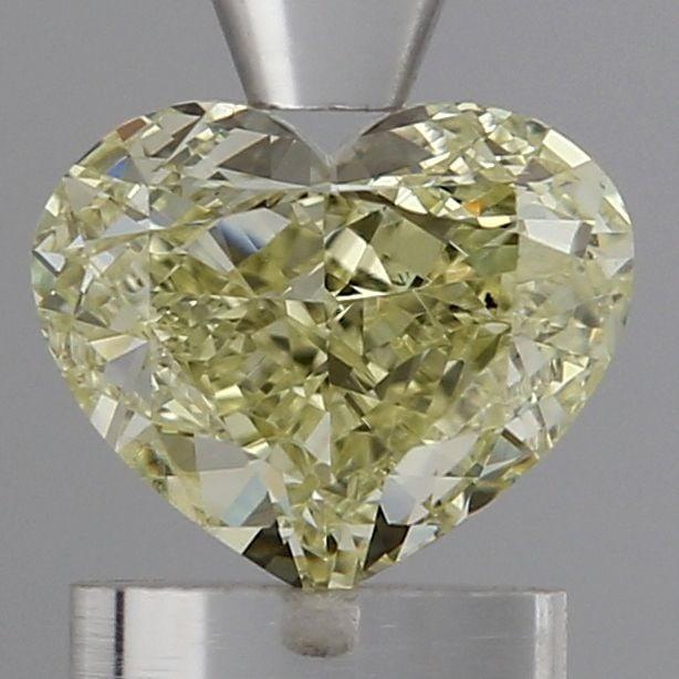 Loose Diamond - HEART 1.17ct Fancy Yellow VS1: Loose Diamond - HEART 1.17ct Fancy Yellow VS1 Source: This is a real non-mined Diamond that has been grown in a lab Shape: HEART Carats: 1.17 Color: Fancy Yellow Certification: IGI Video: