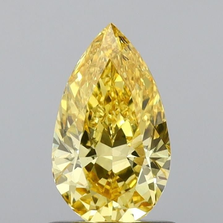 Loose Diamond - PEAR 0.91ct Fancy Vivid Yellow VS1: Loose Diamond - PEAR 0.91ct Fancy Vivid Yellow VS1 Source: This is a real non-mined Diamond that has been grown in a lab Shape: PEAR Carats: 0.91 Color: Fancy Vivid Yellow Certification: IGI Video: