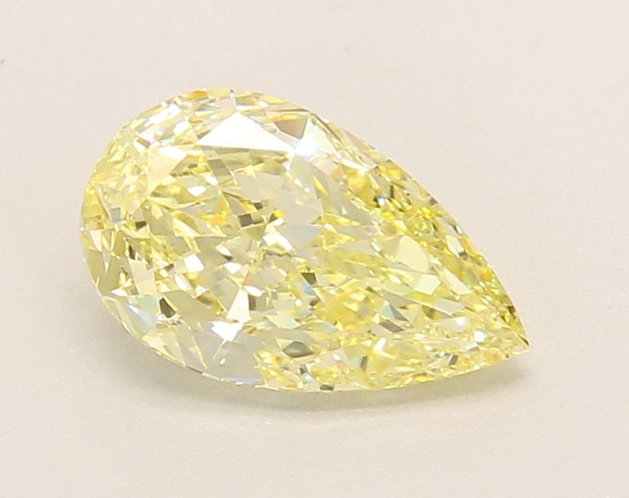 Loose Diamond - PEAR 1.83ct Fancy Yellow VS1: Loose Diamond - PEAR 1.83ct Fancy Yellow VS1 Source: This is a real non-mined Diamond that has been grown in a lab Shape: PEAR Carats: 1.83 Color: Fancy Yellow Certification: IGI Video: