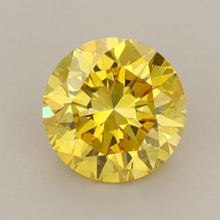 Loose Diamond - ROUND 0.96ct Fancy Vivid Yellow VS2: Loose Diamond - ROUND 0.96ct Fancy Vivid Yellow VS2 Source: This is a real non-mined Diamond that has been grown in a lab Shape: ROUND Carats: 0.96 Color: Fancy Vivid Yellow Certification: IGI Video: