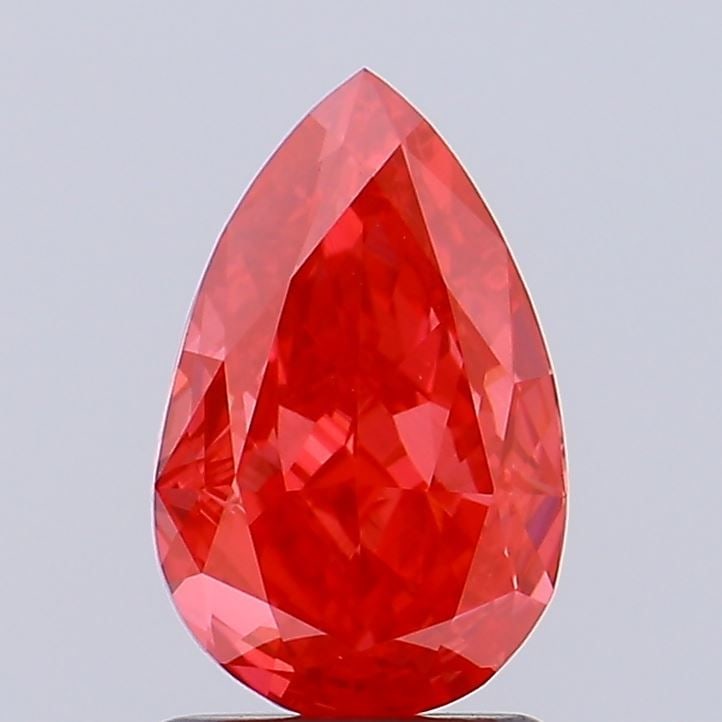 Loose Diamond - PEAR 1.7ct Fancy Vivid Red VVS2: Loose Diamond - PEAR 1.7ct Fancy Vivid Red VVS2 Source: This is a real non-mined Diamond that has been grown in a lab Shape: PEAR Carats: 1.7 Color: Fancy Vivid Red Certification: NONE Video: