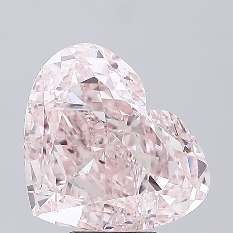 Loose Diamond - HEART 7.05ct Fancy Pink VS1: Loose Diamond - HEART 7.05ct Fancy Pink VS1 Source: This is a real non-mined Diamond that has been grown in a lab Shape: HEART Carats: 7.05 Color: Fancy Pink Certification: IGI Video: