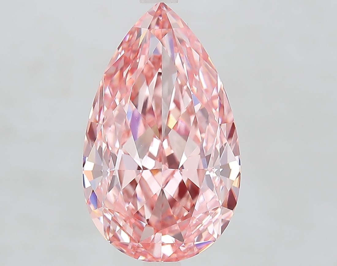 Loose Diamond - PEAR 6.07ct Fancy Vivid Pink VVS2: Loose Diamond - PEAR 6.07ct Fancy Vivid Pink VVS2 Source: This is a real non-mined Diamond that has been grown in a lab Shape: PEAR Carats: 6.07 Color: Fancy Vivid Pink Certification: IGI Video: