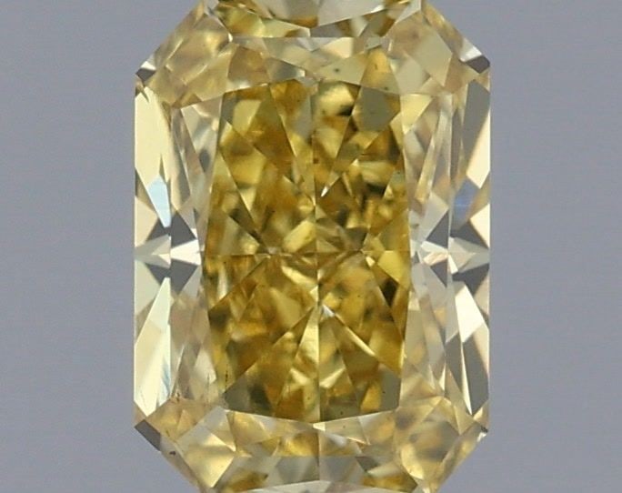 Loose Diamond - RADIANT 0.4ct Fancy Intense Yellow VS1: Loose Diamond - RADIANT 0.4ct Fancy Intense Yellow VS1 Source: This is a real non-mined Diamond that has been grown in a lab Shape: RADIANT Carats: 0.4 Color: Fancy Intense Yellow Certification: IGI V