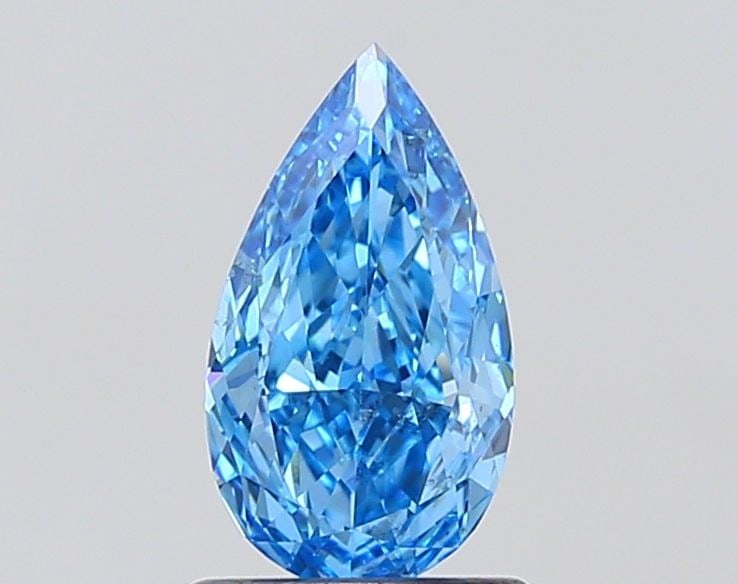 Loose Diamond - PEAR 1.0ct Fancy Vivid Blue VS1: Loose Diamond - PEAR 1.0ct Fancy Vivid Blue VS1 Source: This is a real non-mined Diamond that has been grown in a lab Shape: PEAR Carats: 1.0 Color: Fancy Vivid Blue Certification: IGI Video:
