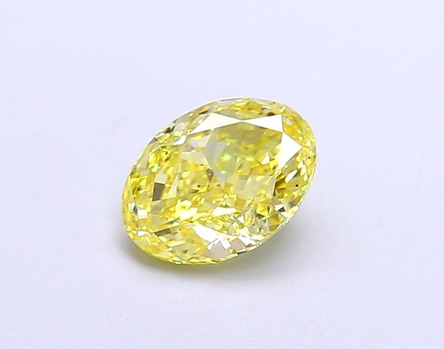 Loose Diamond - OVAL 1.11ct Fancy Vivid Yellow VVS2: Loose Diamond - OVAL 1.11ct Fancy Vivid Yellow VVS2 Source: This is a real non-mined Diamond that has been grown in a lab Shape: OVAL Carats: 1.11 Color: Fancy Vivid Yellow Certification: IGI Video: