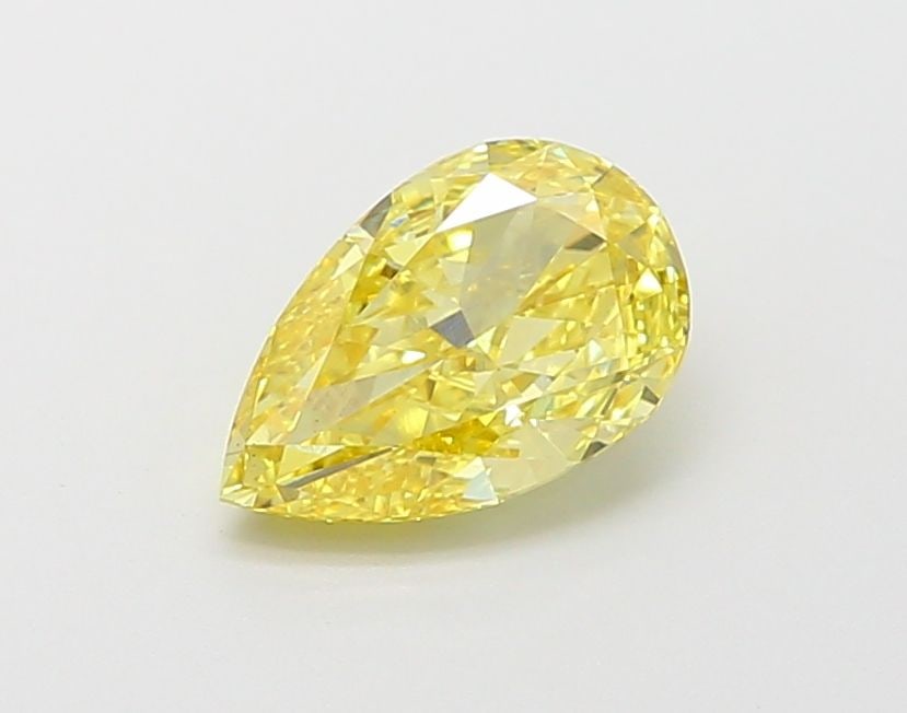 Loose Diamond - PEAR 1.33ct Fancy Vivid Yellow VS1: Loose Diamond - PEAR 1.33ct Fancy Vivid Yellow VS1 Source: This is a real non-mined Diamond that has been grown in a lab Shape: PEAR Carats: 1.33 Color: Fancy Vivid Yellow Certification: IGI Video: