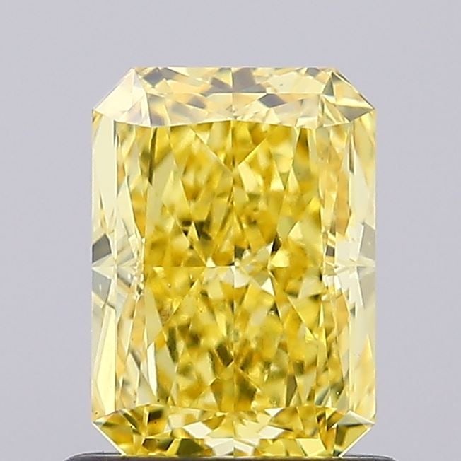 Loose Diamond - RADIANT 1.05ct Fancy Vivid Yellow VS2: Loose Diamond - RADIANT 1.05ct Fancy Vivid Yellow VS2 Source: This is a real non-mined Diamond that has been grown in a lab Shape: RADIANT Carats: 1.05 Color: Fancy Vivid Yellow Certification: IGI Vid