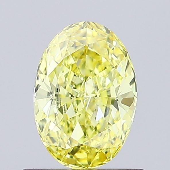 Loose Diamond - OVAL 0.61ct Fancy Intense Yellow VS1: Loose Diamond - OVAL 0.61ct Fancy Intense Yellow VS1 Source: This is a real non-mined Diamond that has been grown in a lab Shape: OVAL Carats: 0.61 Color: Fancy Intense Yellow Certification: IGI Video