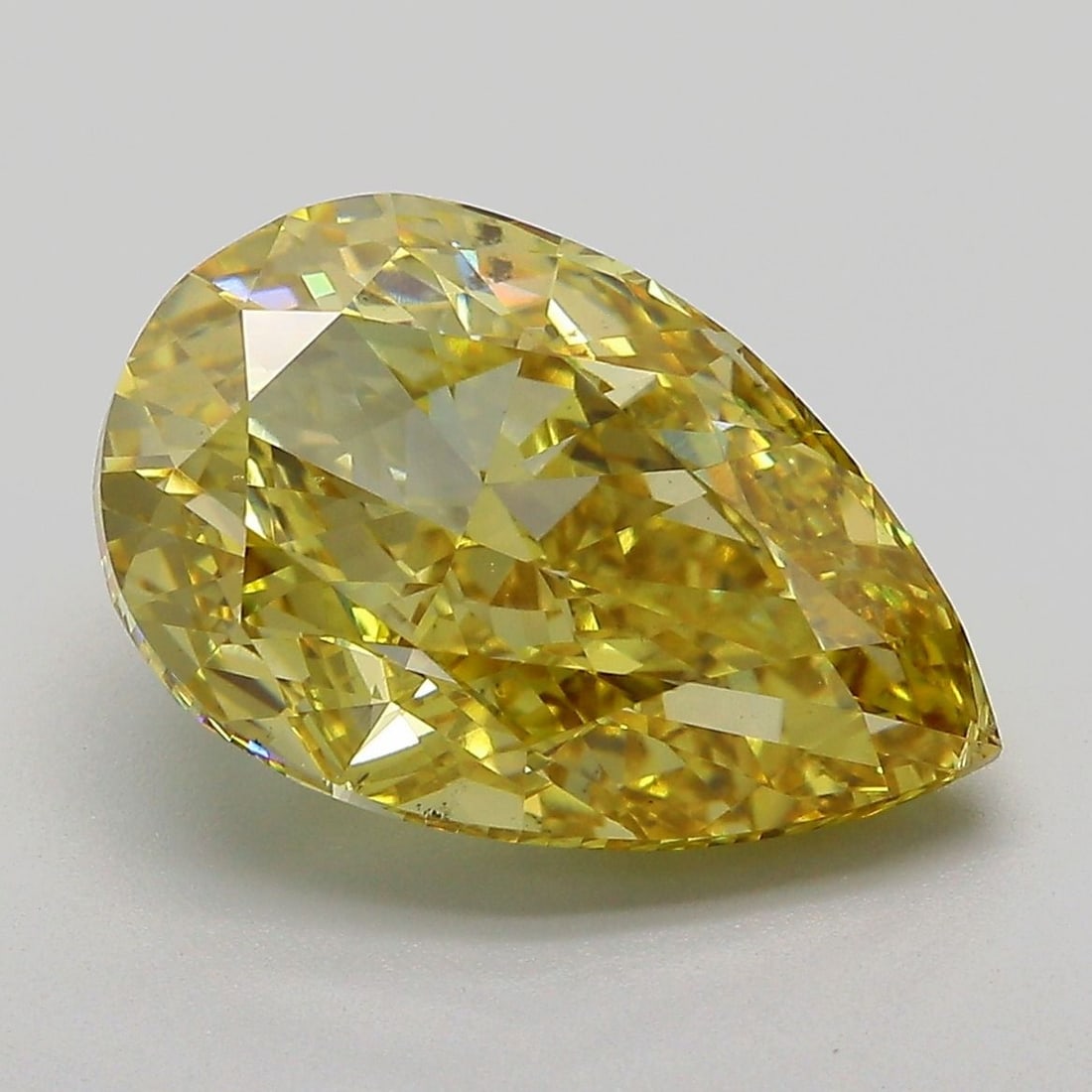 Loose Diamond - PEAR 6.01ct Fancy Vivid Yellow VS2: Loose Diamond - PEAR 6.01ct Fancy Vivid Yellow VS2 Source: This is a real non-mined Diamond that has been grown in a lab Shape: PEAR Carats: 6.01 Color: Fancy Vivid Yellow Certification: IGI Video: