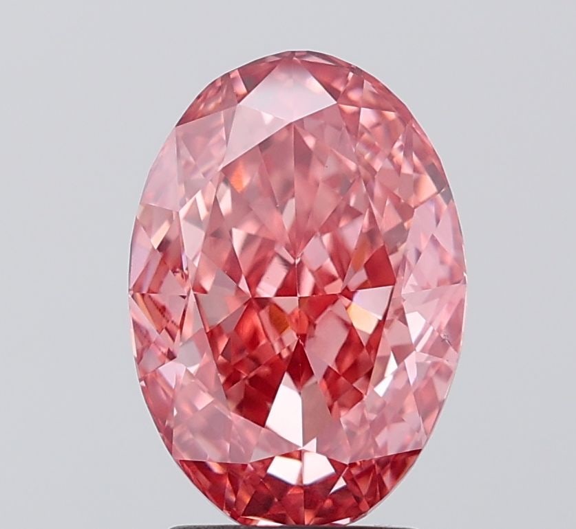 Loose Diamond - OVAL 3.21ct Fancy Vivid Pink VS1: Loose Diamond - OVAL 3.21ct Fancy Vivid Pink VS1 Source: This is a real non-mined Diamond that has been grown in a lab Shape: OVAL Carats: 3.21 Color: Fancy Vivid Pink Certification: IGI Video: