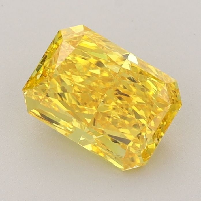 Loose Diamond - RADIANT 1.22ct Fancy Vivid Yellow VS1: Loose Diamond - RADIANT 1.22ct Fancy Vivid Yellow VS1 Source: This is a real non-mined Diamond that has been grown in a lab Shape: RADIANT Carats: 1.22 Color: Fancy Vivid Yellow Certification: IGI Vid