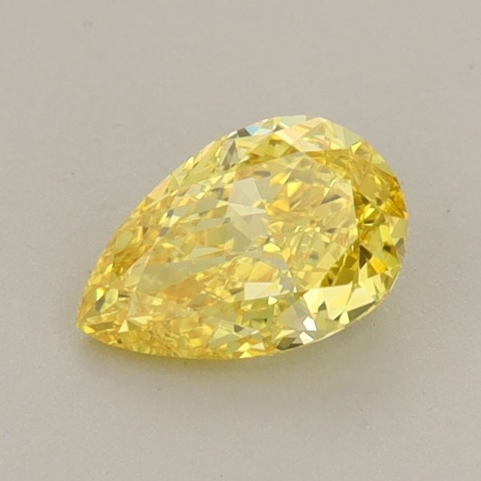 Loose Diamond - PEAR 0.65ct Fancy Vivid Yellow VS1: Loose Diamond - PEAR 0.65ct Fancy Vivid Yellow VS1 Source: This is a real non-mined Diamond that has been grown in a lab Shape: PEAR Carats: 0.65 Color: Fancy Vivid Yellow Certification: IGI Video: