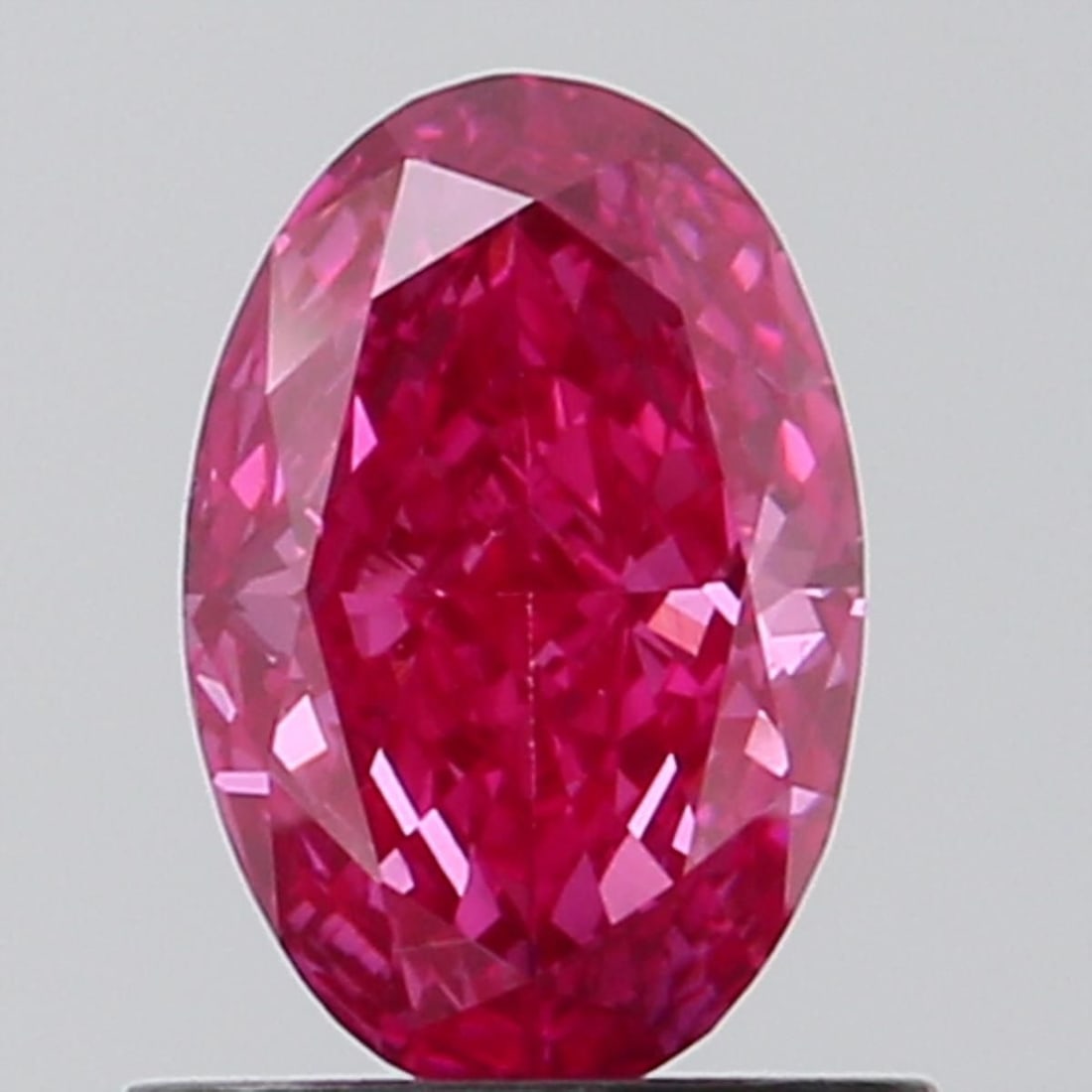 Loose Diamond - OVAL 0.83ct Fancy Vivid Pink VVS2: Loose Diamond - OVAL 0.83ct Fancy Vivid Pink VVS2 Source: This is a real non-mined Diamond that has been grown in a lab Shape: OVAL Carats: 0.83 Color: Fancy Vivid Pink Certification: NONE Video: